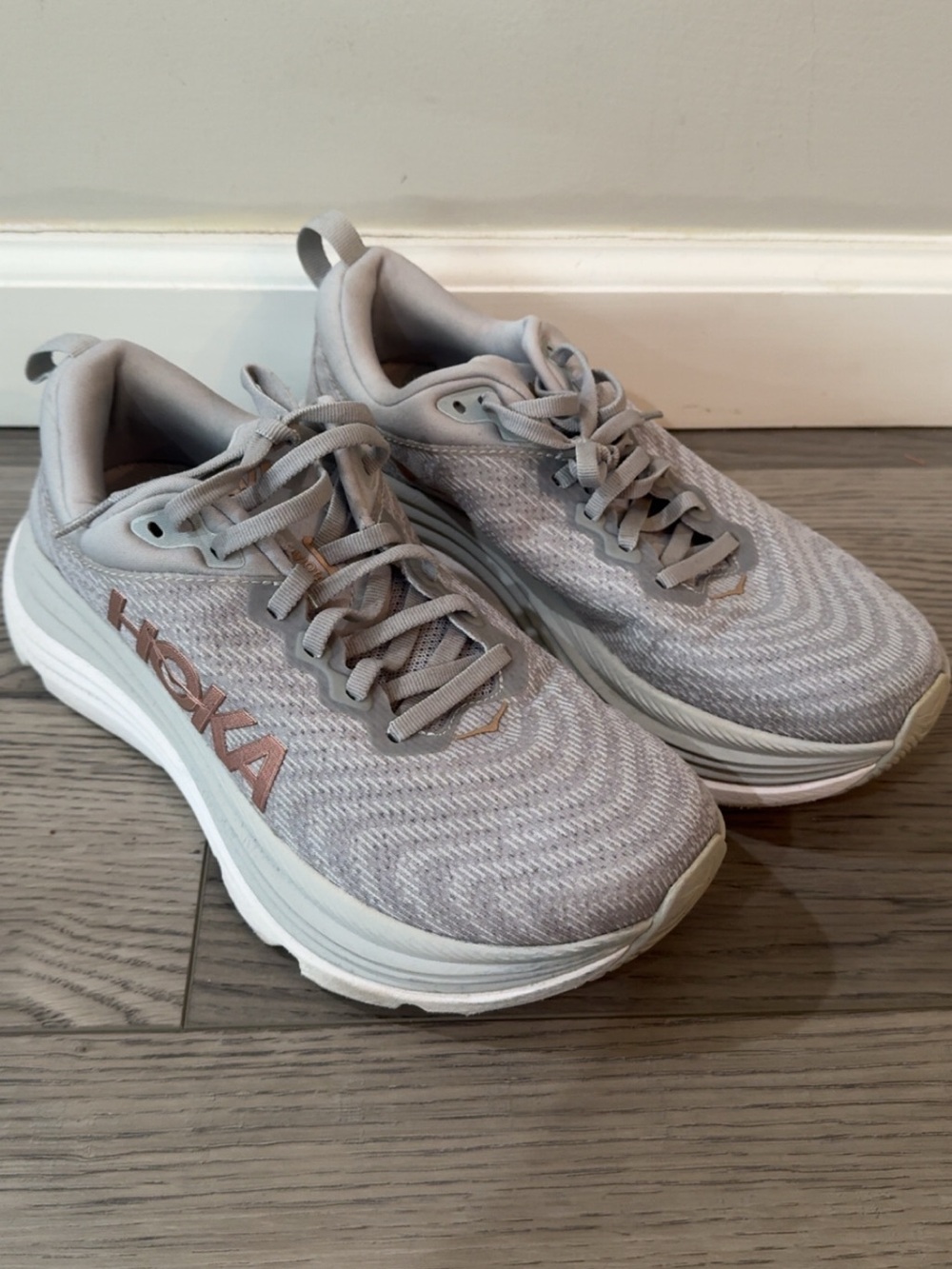 HOKA Women's Running Shoes in Light Gray with Rose Gold Logo